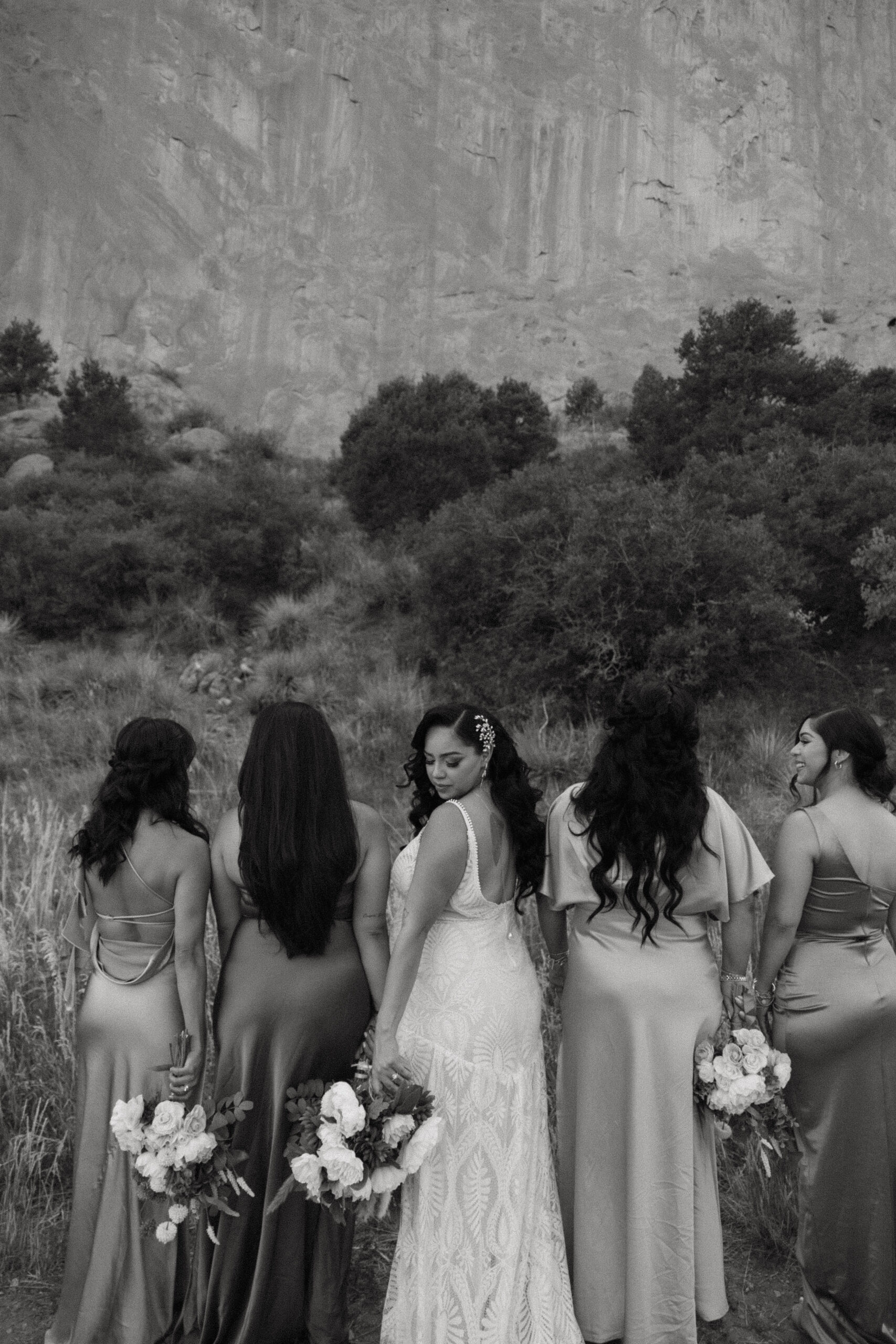 bride and her bridesmaids at wedding at garden of the gods