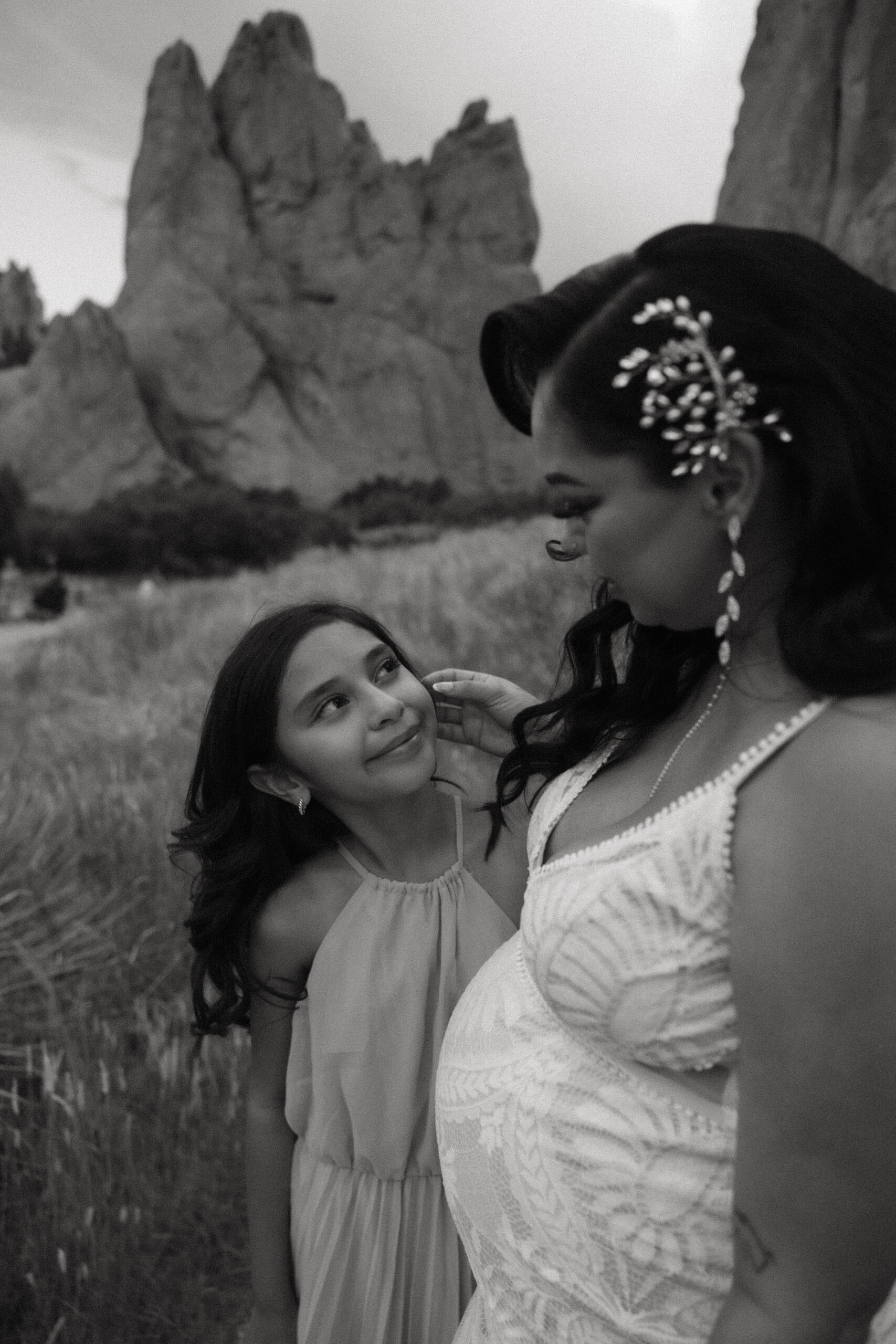 bride and her daughter sharing a moment 