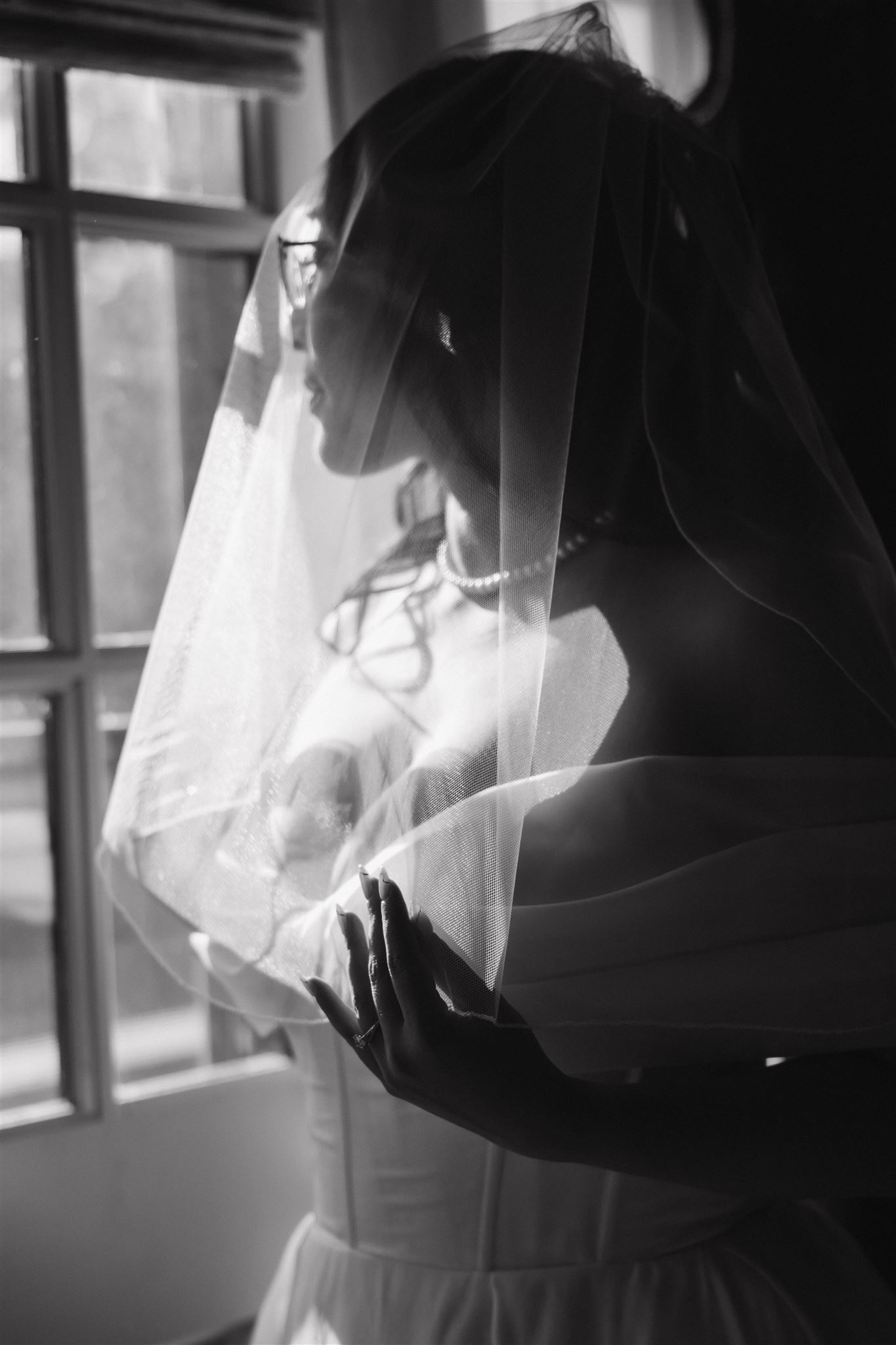 bride detail shot with her veil on 