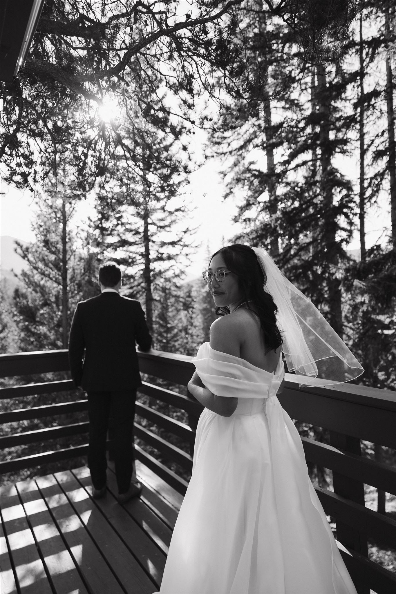 bride looking back at the camera before the first look 