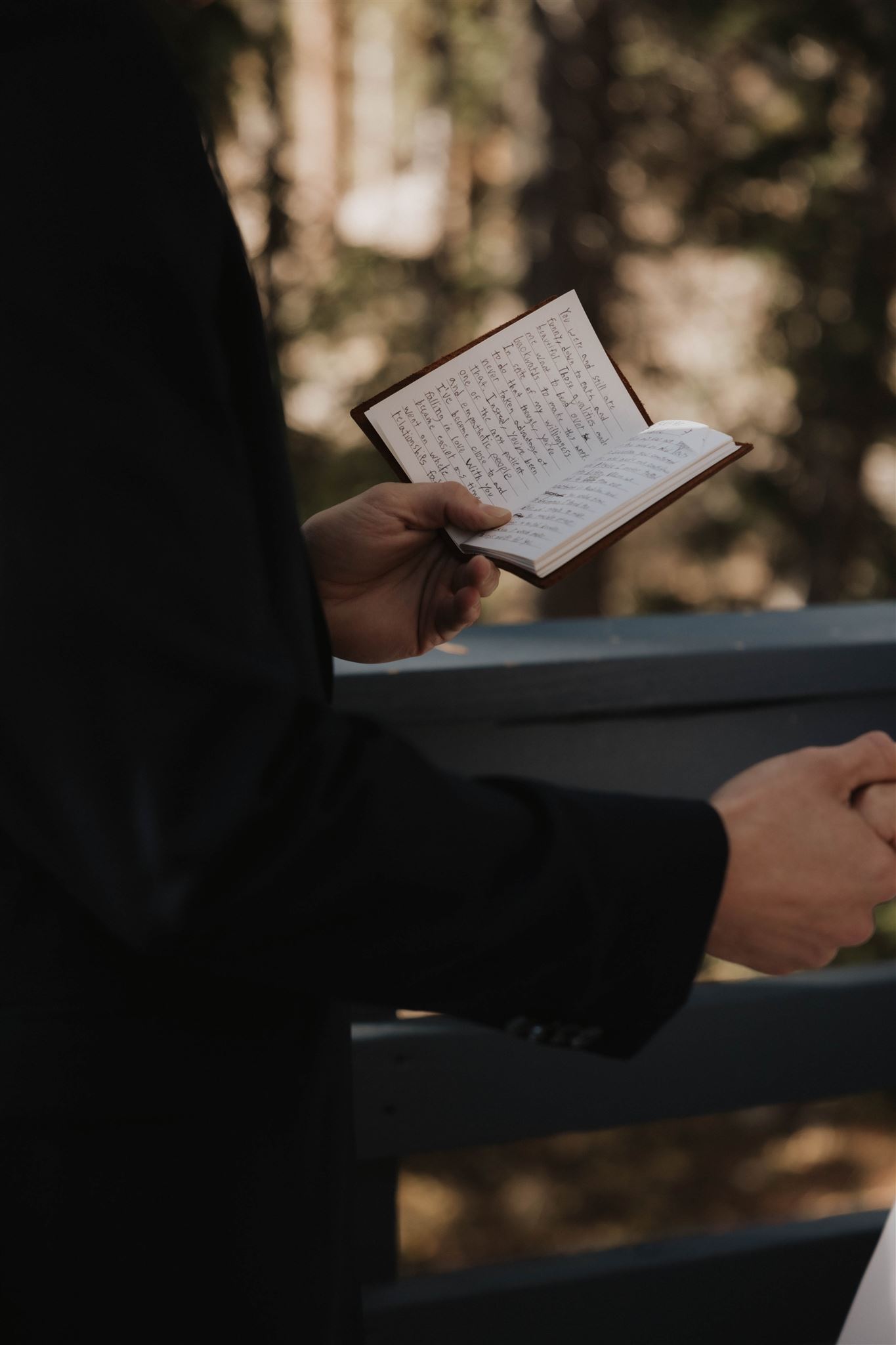 groom's vow book in focus 