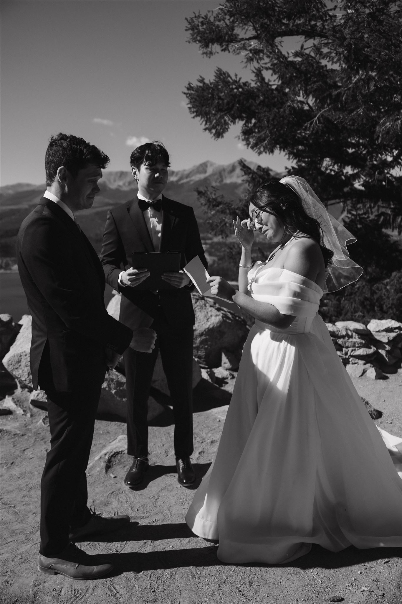 bride and groom reading vows at their intimate micro wedding ceremony 