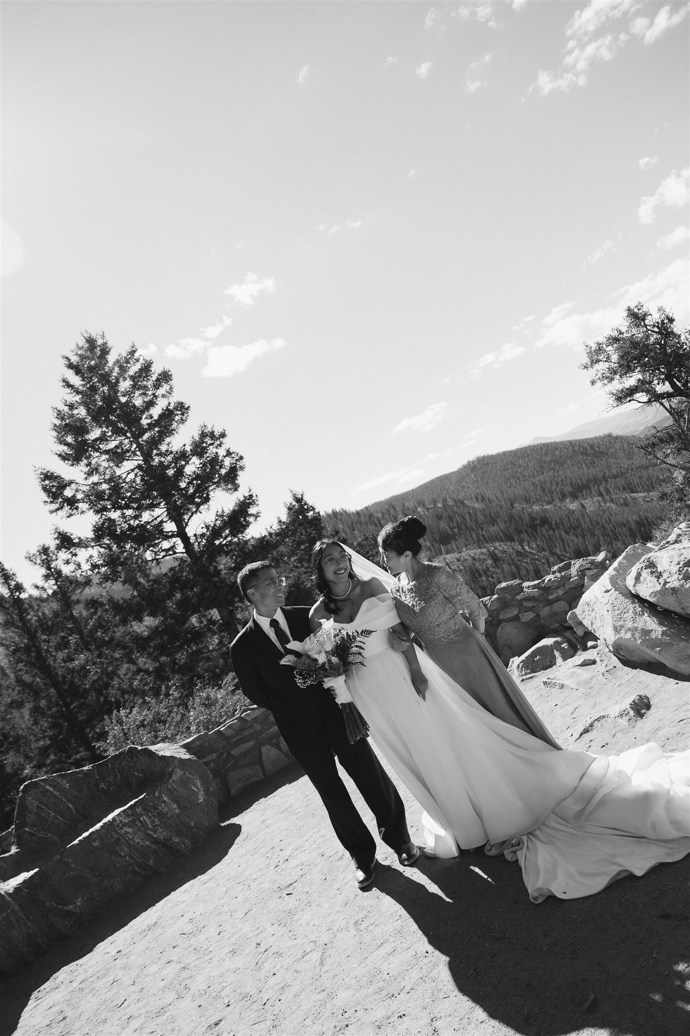 bride and her parents portrait at Sapphire Point