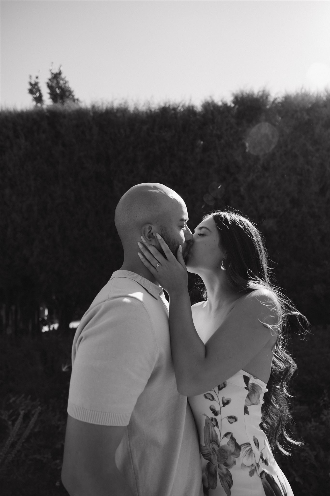 couple kissing during their Denver Botanic Gardens Engagement Photos