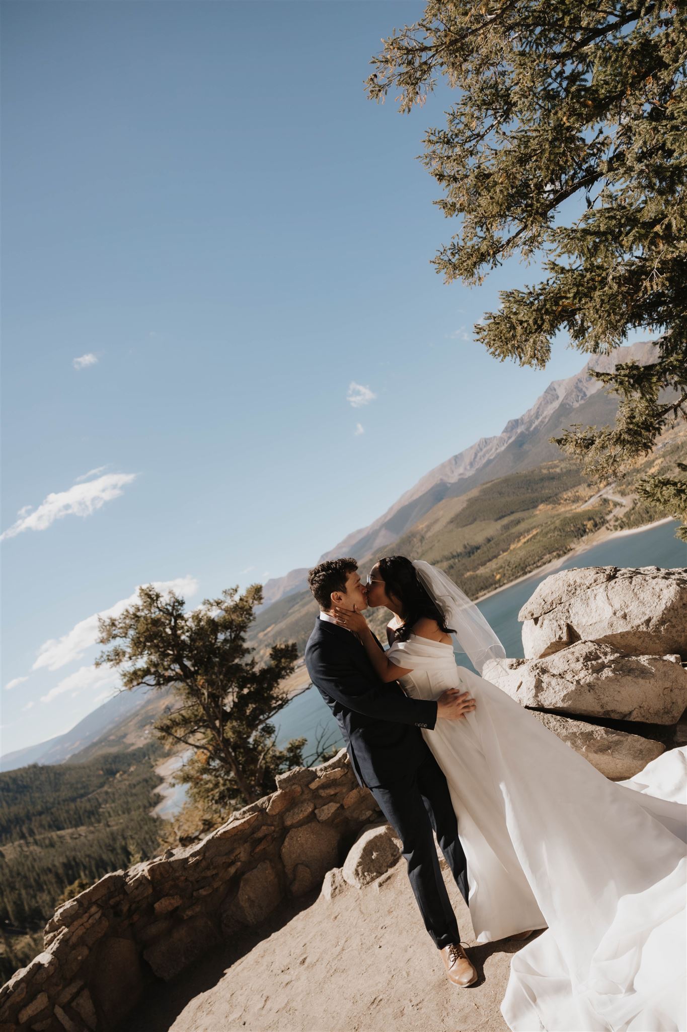 bride and groom kissing at Sapphire Point Elopement ceremony spot