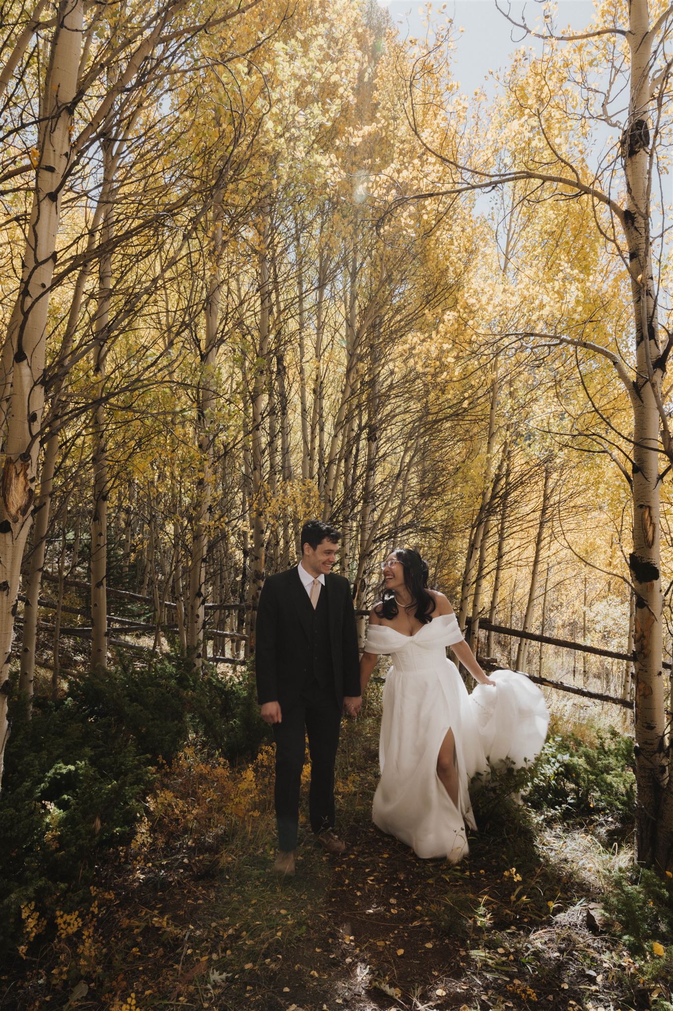 bride and groom portraits in the woods after Sapphire Point Elopement