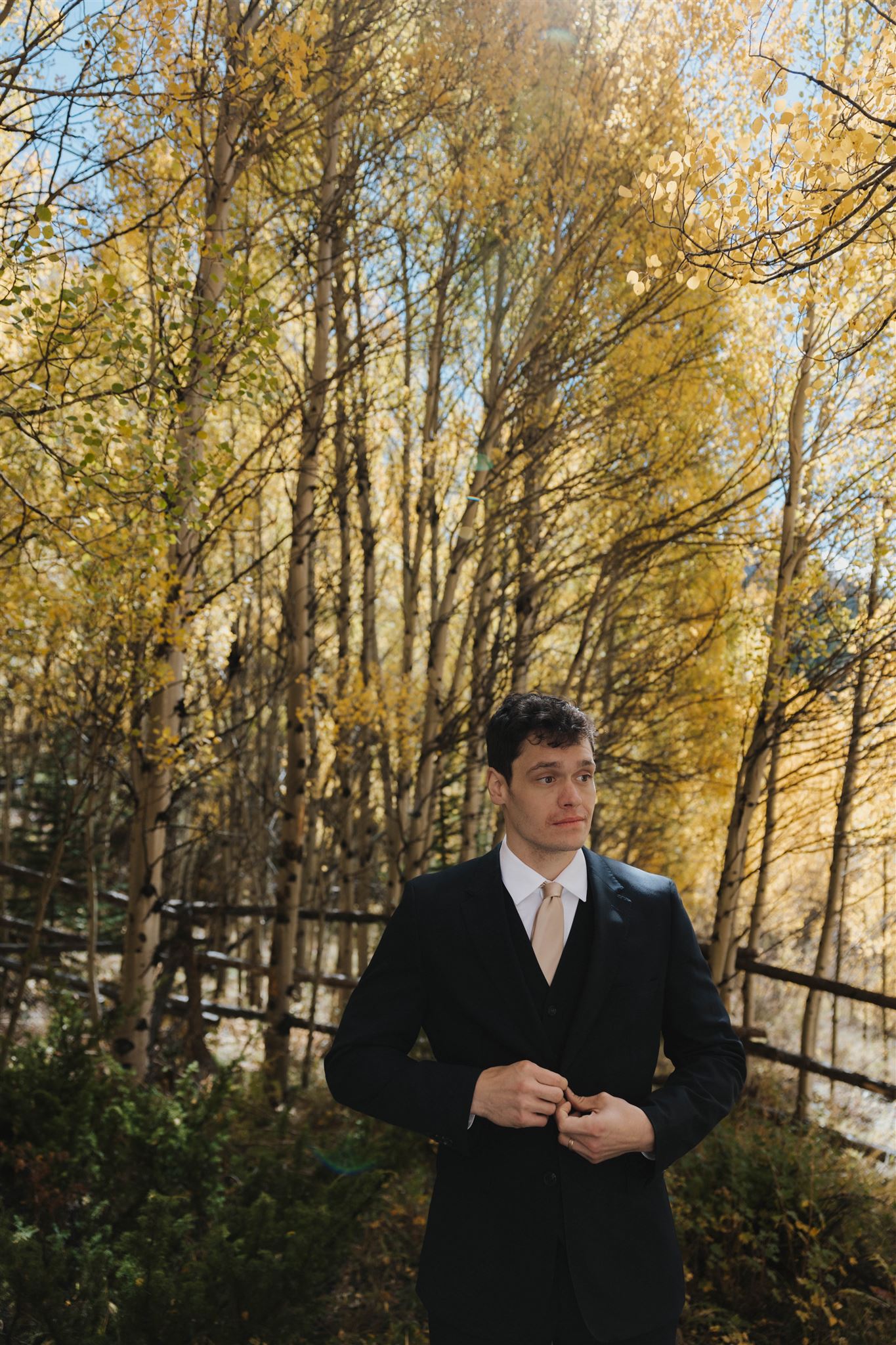 groom portrait in the woods 