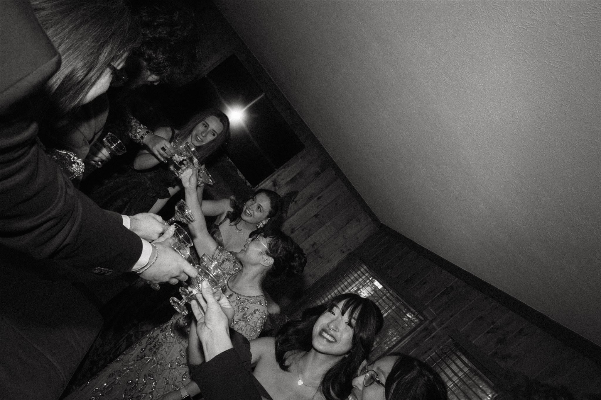 wedding guests doing a toast at the airbnb reception