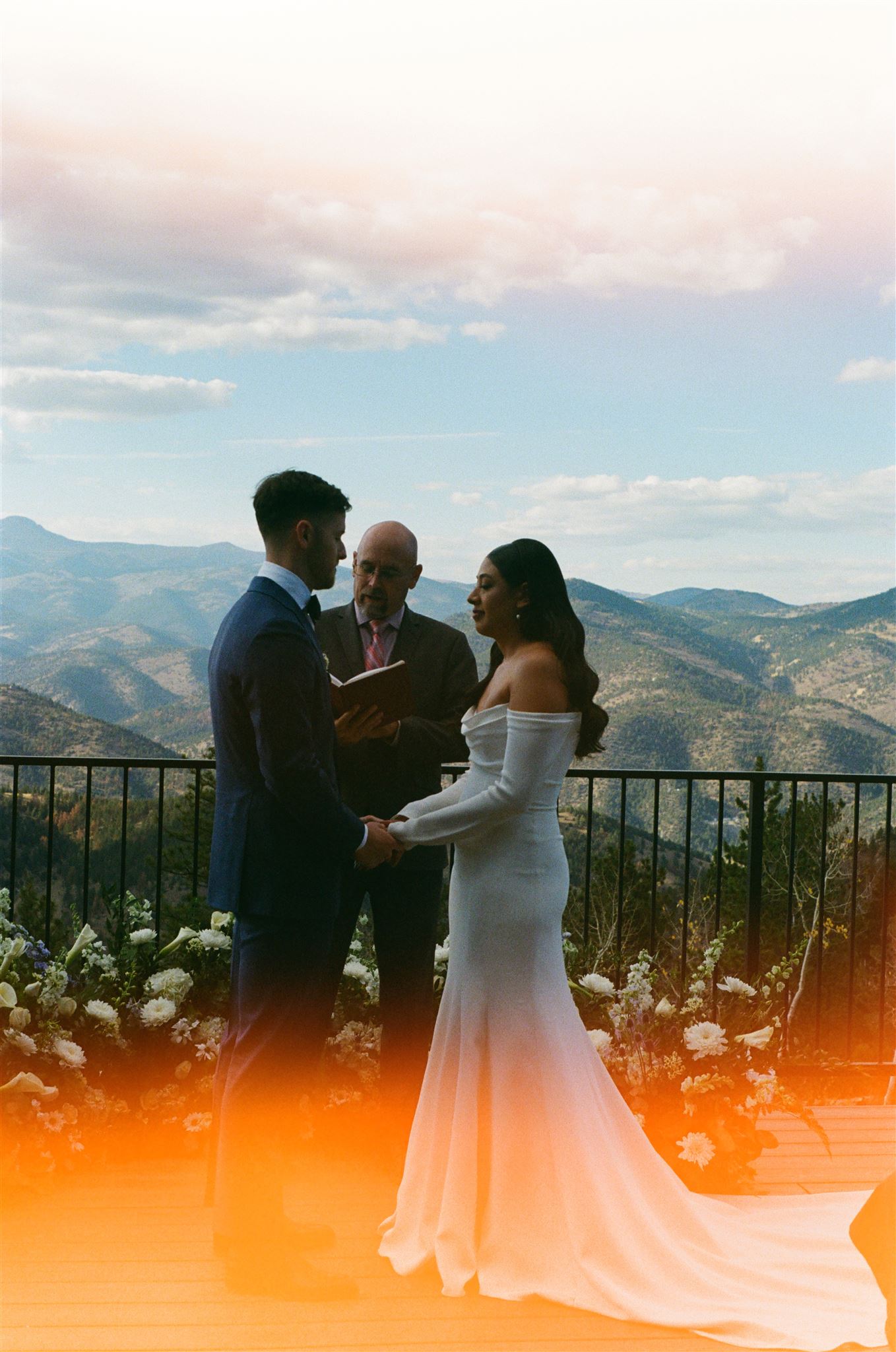 bride and groom during Luxury Micro Wedding ceremony on film