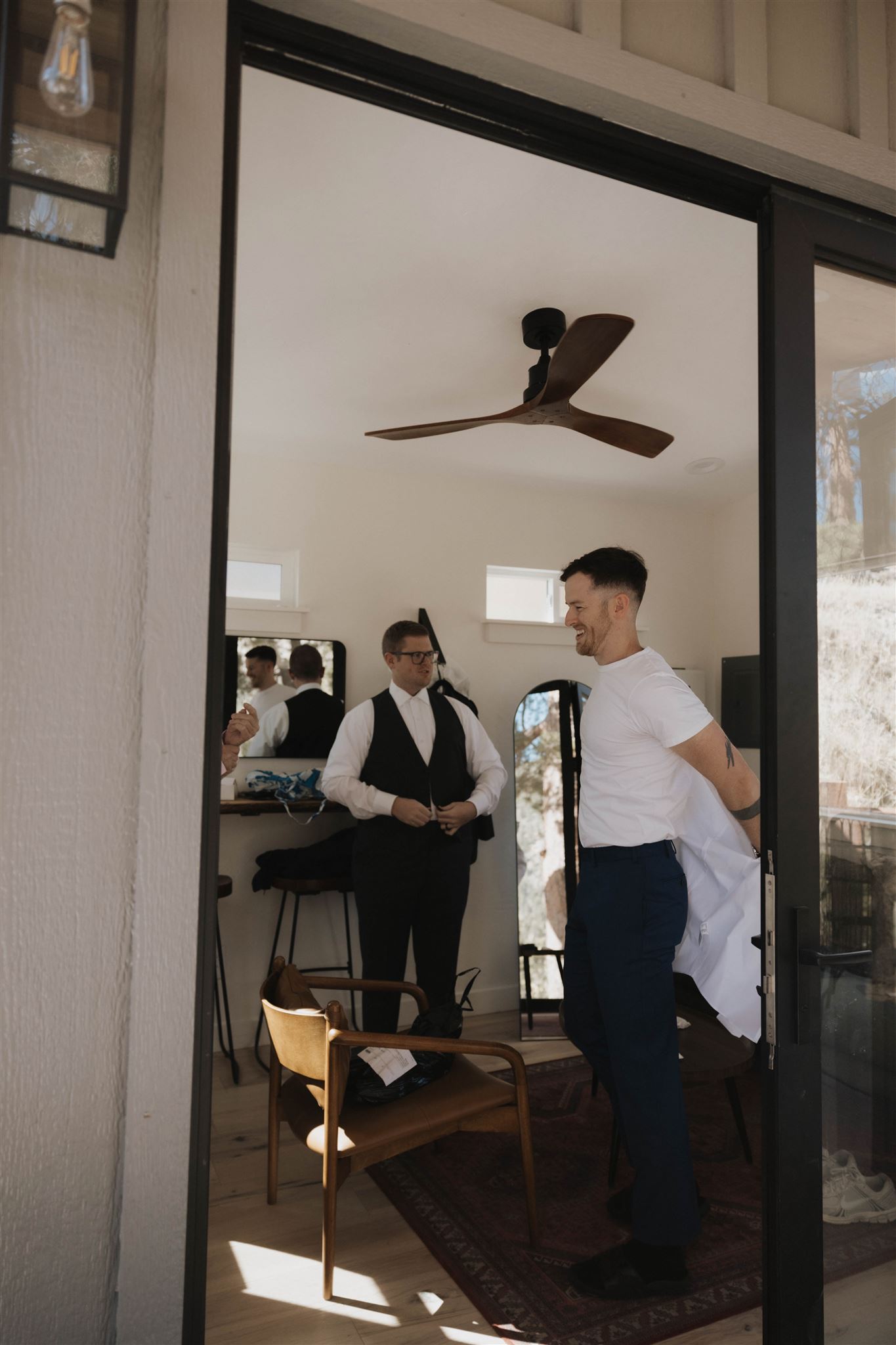 groom getting dressed for the Luxury Micro Wedding