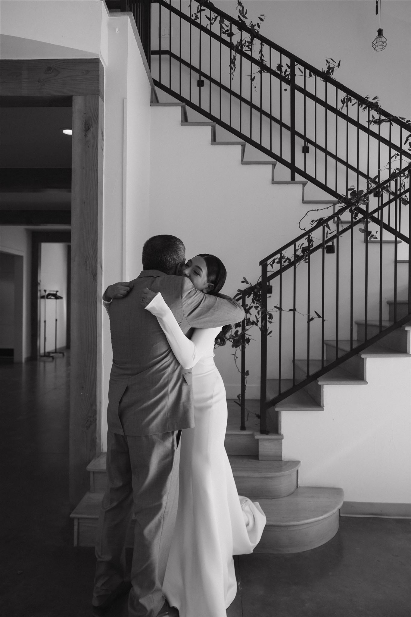 bride and her father hugging 