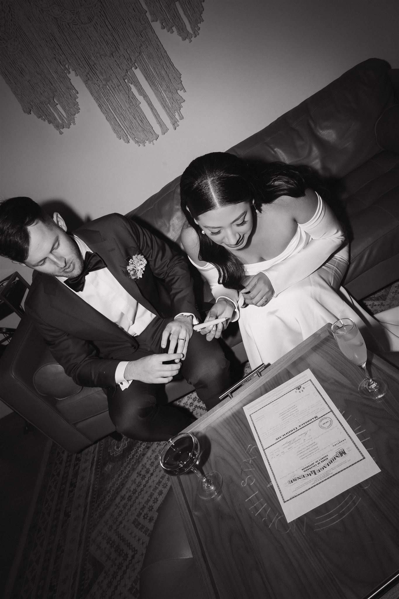 bride and groom signing their marriage license 