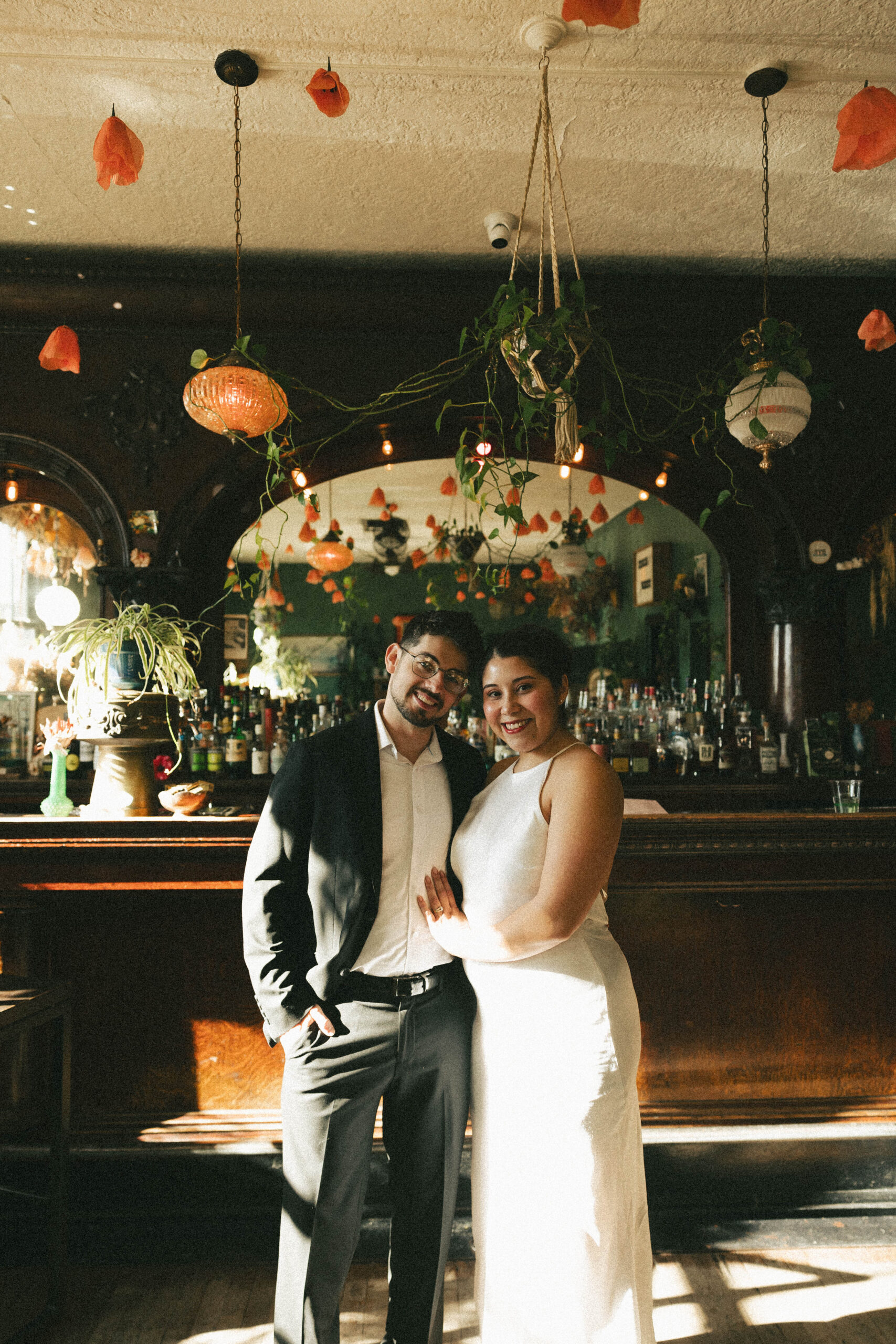 a couple at a bar for their Denver Engagement Photo Locations