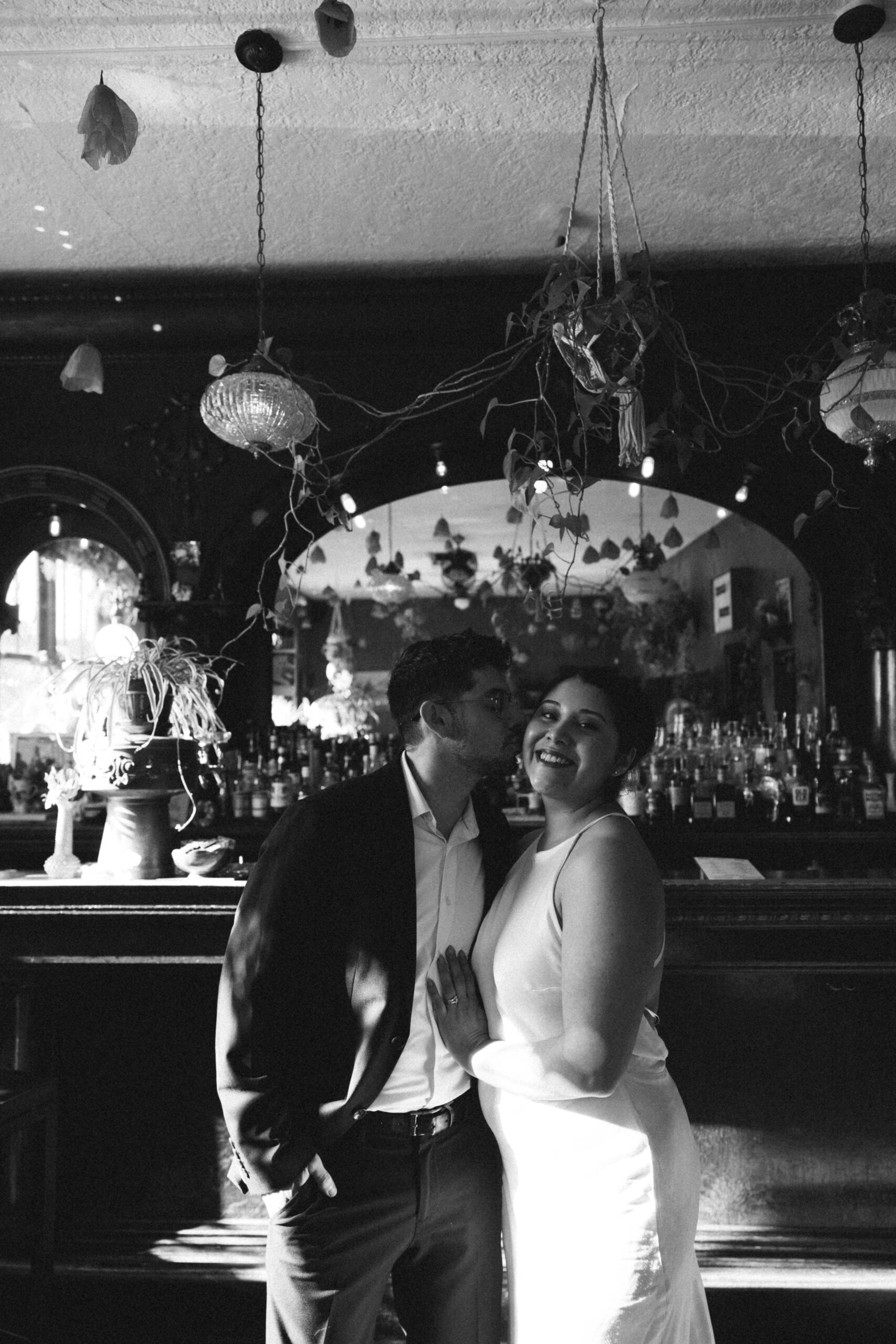 a couple at a bar for their Denver Engagement Photo Location