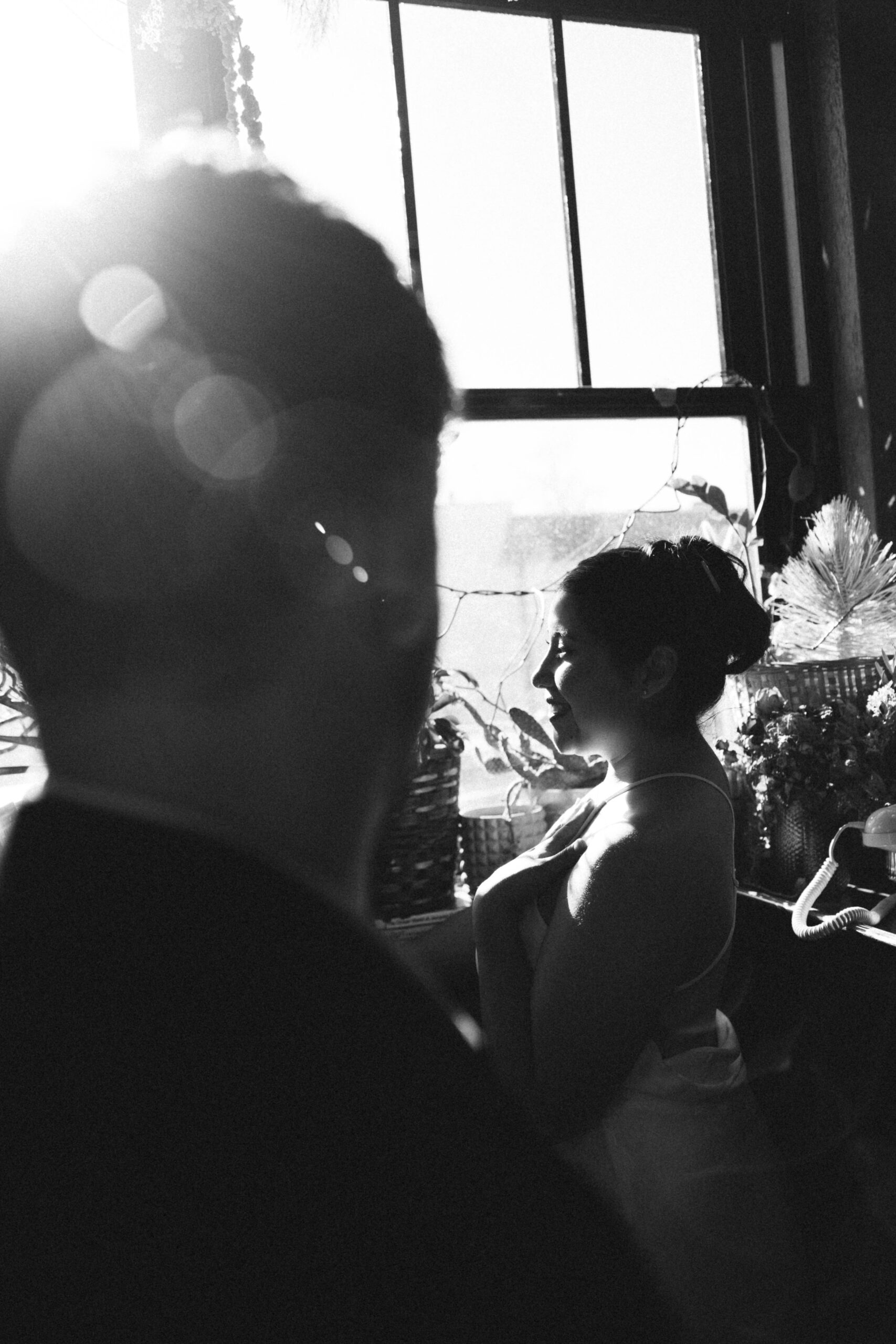 a man looking at a woman during engagement photos 