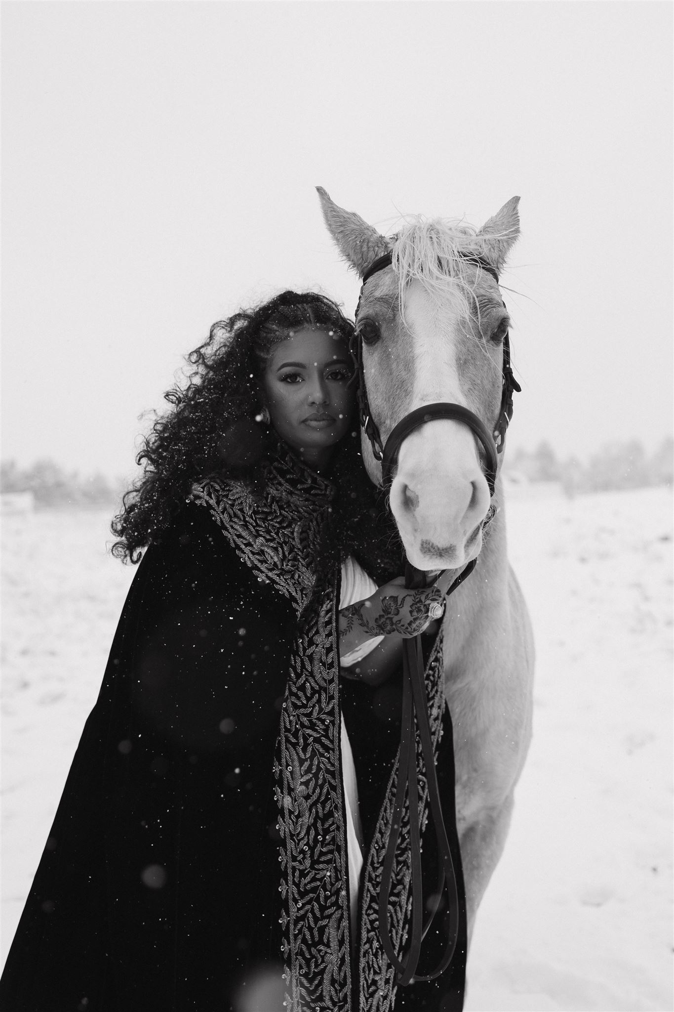 bride to be portrait with a horse during unique engagement photos