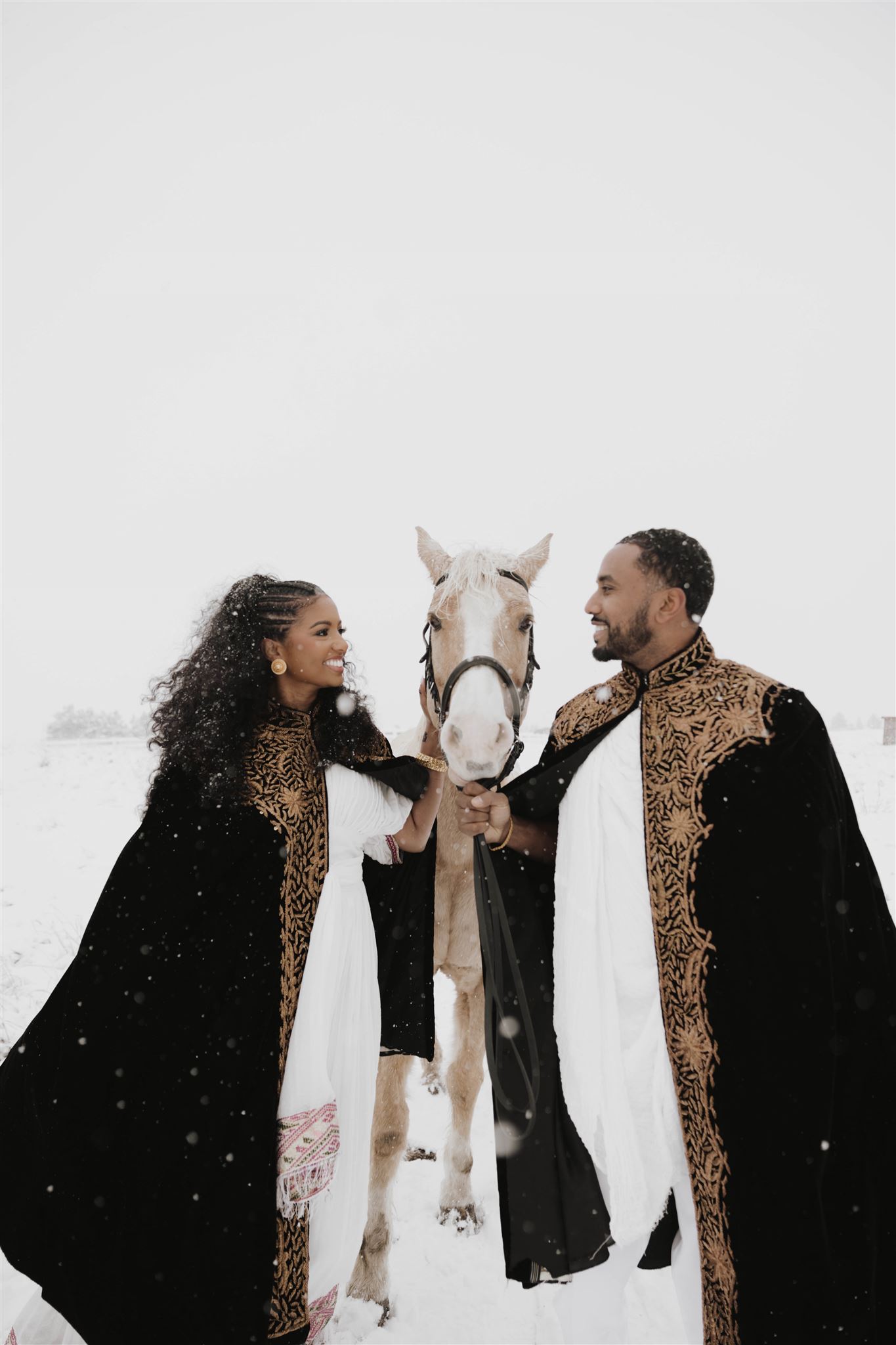 winter engagement photos with a horse